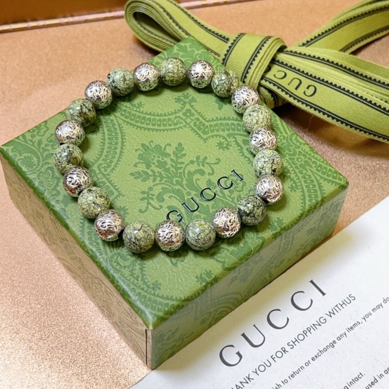 G*u*i bracelets